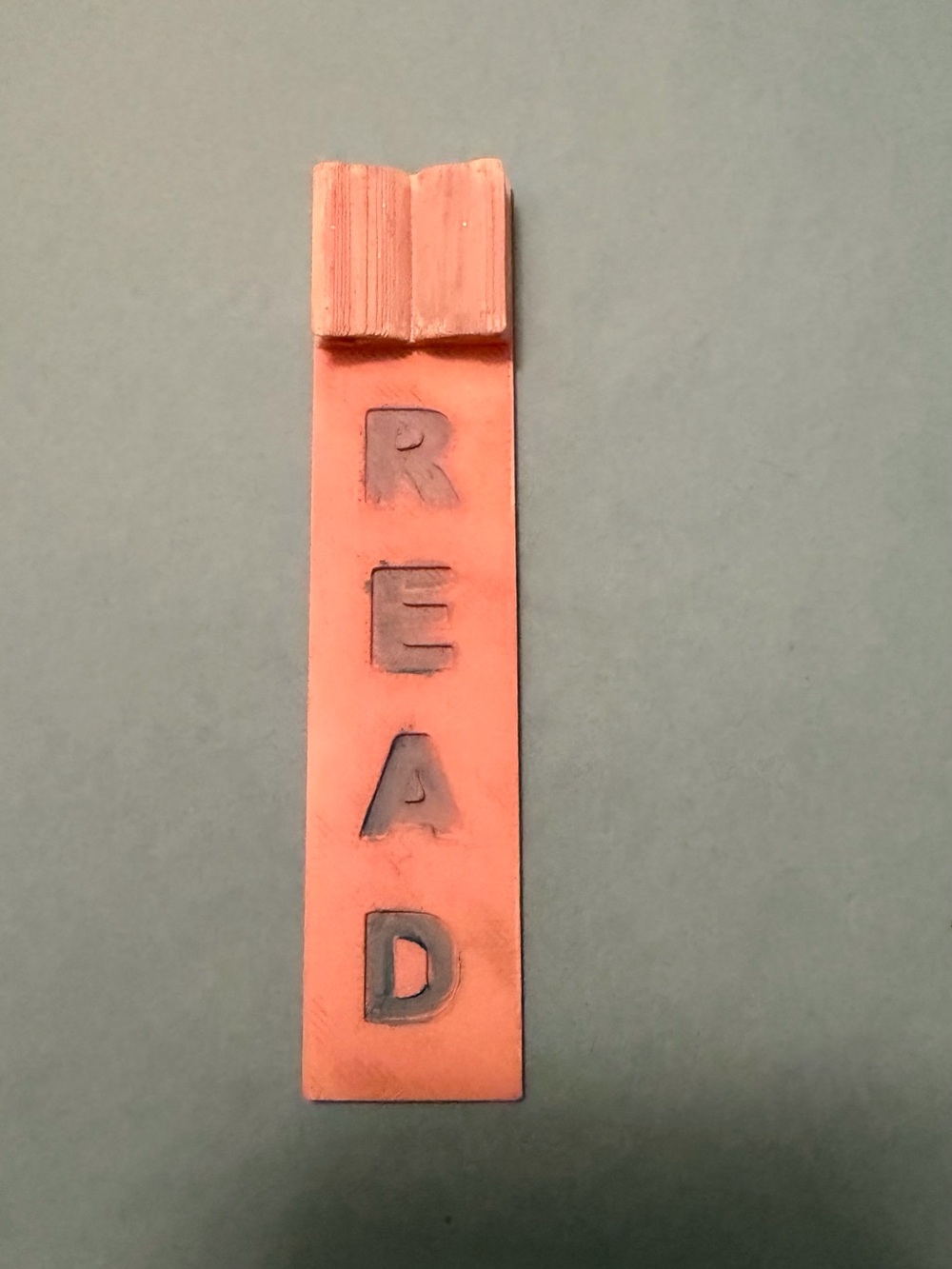 Coral Pink 'READ' Bookmark 3d printed